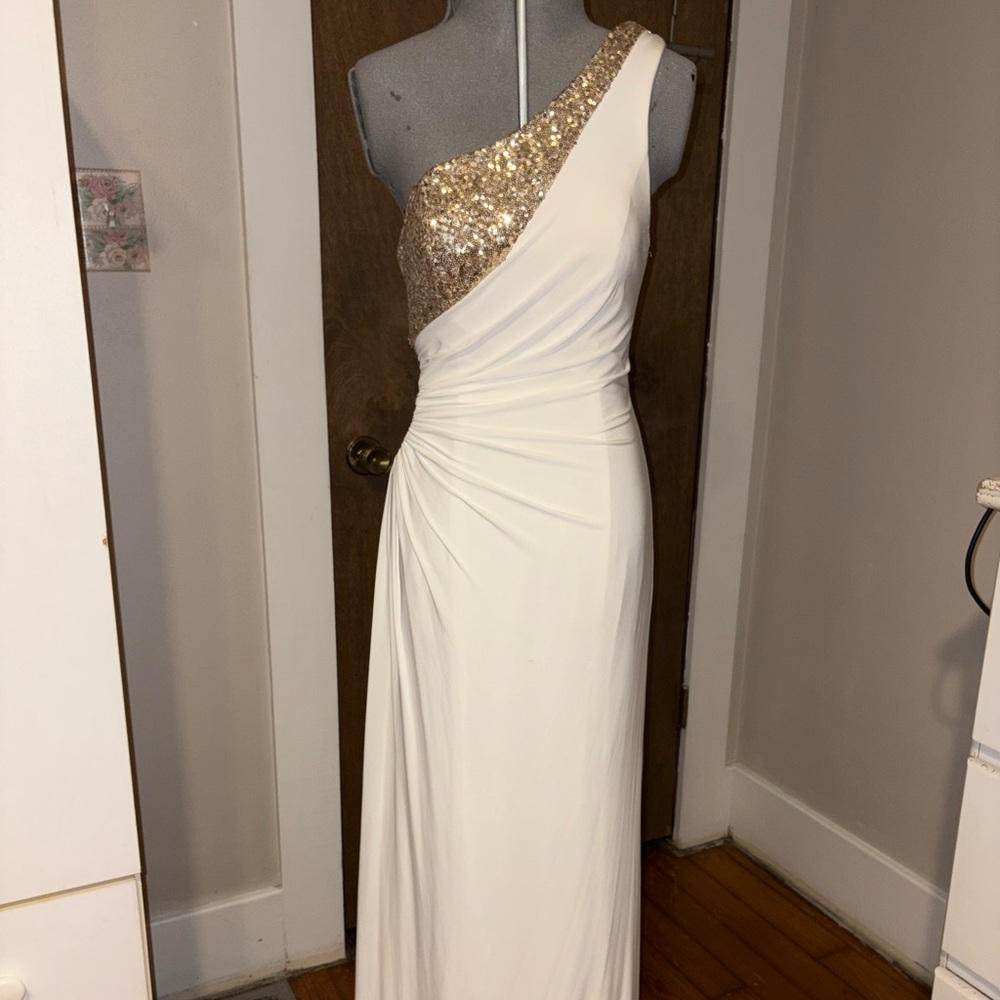 Floor length open back with hole on the side size 4